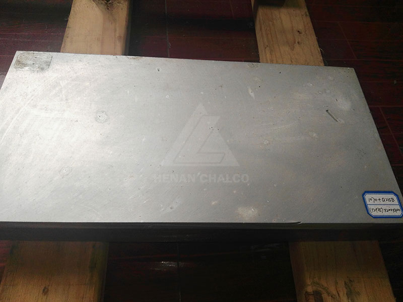 Bimetal clad plate for worm blade